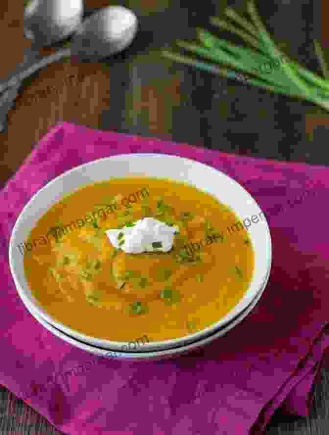 A Bowl Of Roasted Butternut Squash Soup With A Dollop Of Sour Cream Soups Recipes That Make Your Day: Family Friendly Soups To Satisfy Your Soul Stomach: Soup Recipes Easy