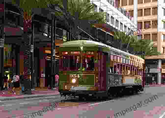 A Green And Cream Perley Streetcar Travels Down St. Charles Avenue. A Streetcar Diary: Images Of New Orleans Streetcars In The Year Before COVID 19