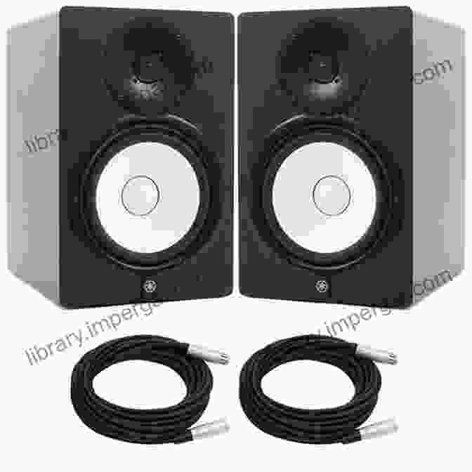 A Pair Of Studio Monitors Sitting On A Desk The Home Recording Studio Essentials For Beginners: How To Build Your Own Recording Studio: Home Recording Basics