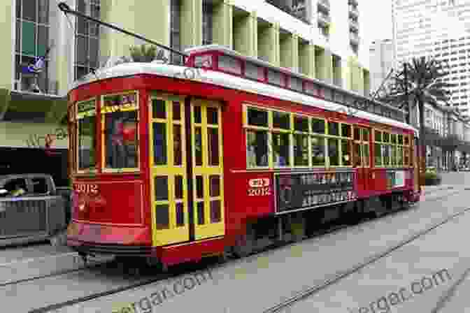 A Red And White St. Charles Streetcar Travels Down Canal Street. A Streetcar Diary: Images Of New Orleans Streetcars In The Year Before COVID 19