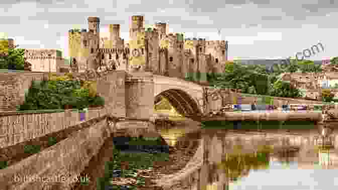 Conwy Castle, With Its Formidable Walls And Imposing Towers, Stands Majestically On The Banks Of The River Conwy. Castles Of Wales