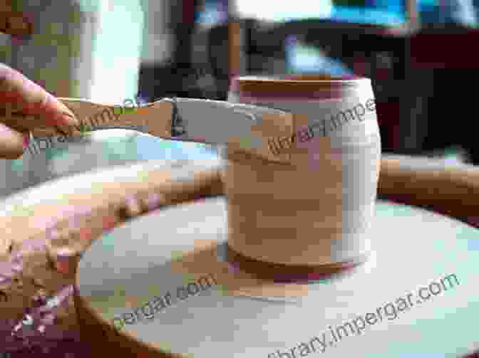 Image Of A Person Glazing A Pottery Vase GUIDE TO MAKE HAND MADE POTTERY VASES: Mastering Hand Craft For Beginners