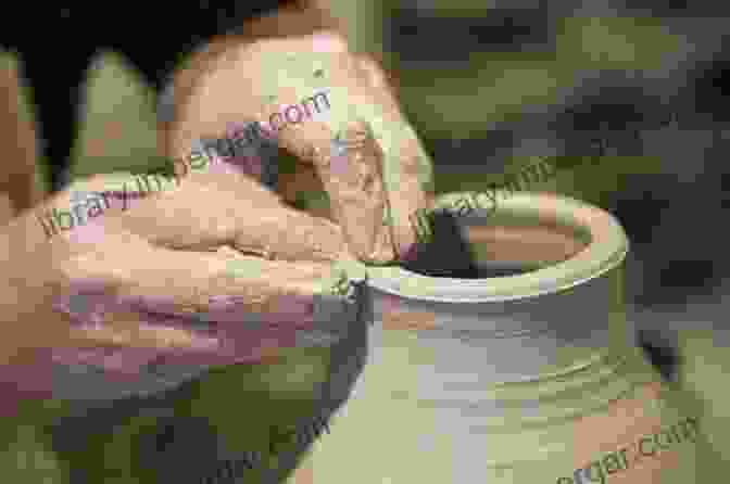 Image Of A Person Shaping Clay On A Pottery Wheel GUIDE TO MAKE HAND MADE POTTERY VASES: Mastering Hand Craft For Beginners