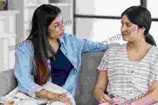 Parent And Teenager Having A Conversation The Adolescent Journey