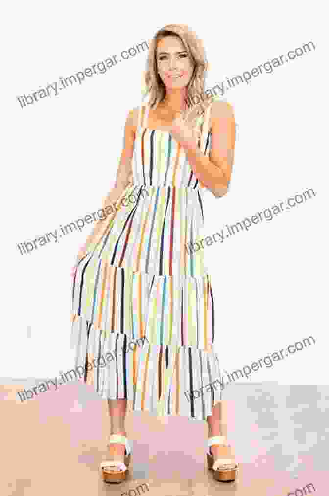 Striped Maxi Dress With Tiered Skirt And Embroidered Belt Marvin Nonis UK Luxury Fashion Magazine Summer Dresses: Mar 22