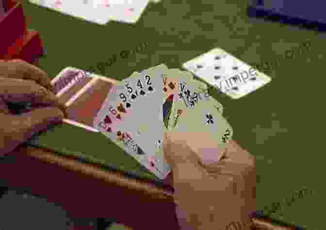 Two People Playing A Game Of Bridge THE GAME OF BRIDGE: WITH THE LAWS OF BRIDGE